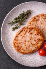 Grilled chicken burger cutlet with salt, spices and herbs