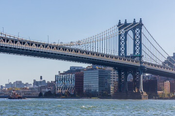 Manhattan Bridge, Brooklyn Waterfront Panorama, and East River Bank viewed from New York City's Lower Manhattan waterfront 