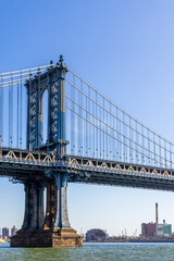 Fototapeta premium Manhattan Bridge, Brooklyn Waterfront Panorama, and East River Bank viewed from New York City's Lower Manhattan waterfront 