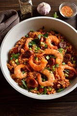 Delicious creole jambalaya with prawn, smoked sausages and vegetables