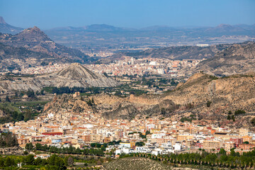 Fototapeta premium View of the Ricote Valley with the cities of Blanca, Abarán and Cieza in the background on a sunny day