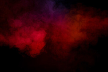 Fototapeta premium Orange and red steam on a black background.