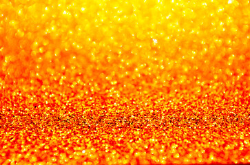 Orange bronze colorful shining glitter background Party concept Shimmering surface New year...