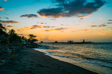 view of a dock in the sunset
