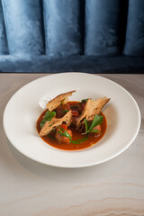 meatballs with tomato sauce and sliced toasted bread