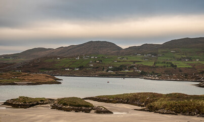 view of the river in the mountains in the background
