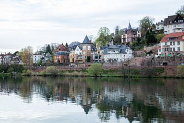 Fototapeta premium Heidelberg, Germany - 31.03.2024 - View of Beautiful Heidelberg, Reflection in Neckar River, Easter 2024
