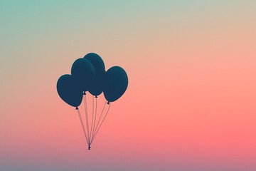 Fototapeta premium Silhouette of a set of floating balloons on a smooth, pastel gradient background