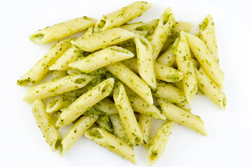 Pasta al Pesto – Pasta with basil pesto White BG, overhead shot,  Pasta with basil pesto sauce, white background, natural lighting, beautiful meal, captivating color