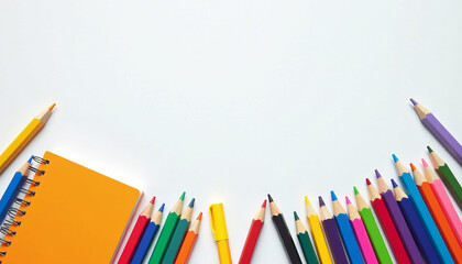 Fototapeta premium Colorful Pencils and Notepad on White Background