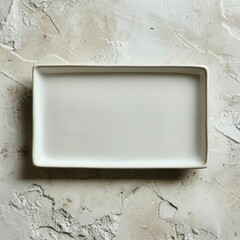 Rectangular white plate on a light stone background  the concept of food  restaurant