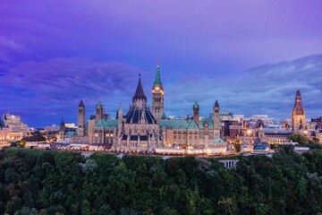 Parliament of Canada and downtown Ottawa at night, Ontario, Canada.