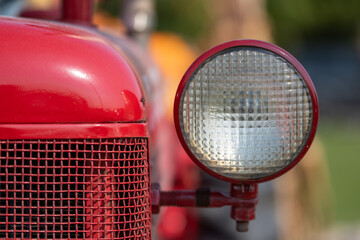 headlight of a red car