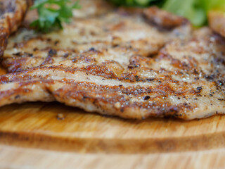 Steak sprinkled with black pepper