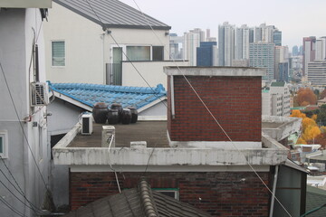 Traditional Korean fermentation jars on rooftop terrace