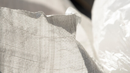 Close up of white polyethylene film bag in plastic bag.
