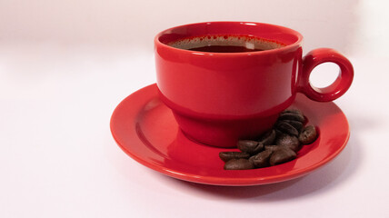 Isolated Red Coffee Cup with brown beans in white background