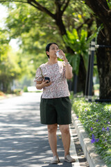 Portrait of Asia women walking on the street in the city
