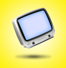 Retro TV set in air on yellow background