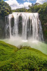 Obraz premium China Guizhou Huangguoshu Waterfall in Summer. It is one of the largest waterfalls in China and Asia