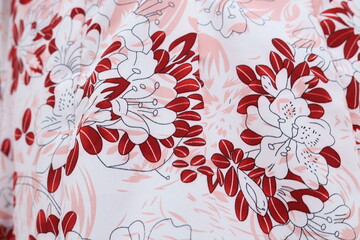 Red floral patterned fabric for the background