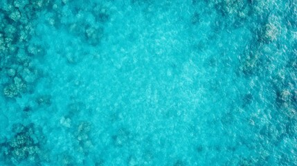 Azure Serenity: An Aerial View of a Turquoise Ocean.  A captivating image of tranquil, clear water, perfect for travel, nature, and serenity themes. 