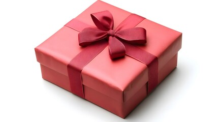 Obraz premium A beautifully wrapped red gift box with a bow, perfect for celebrations.