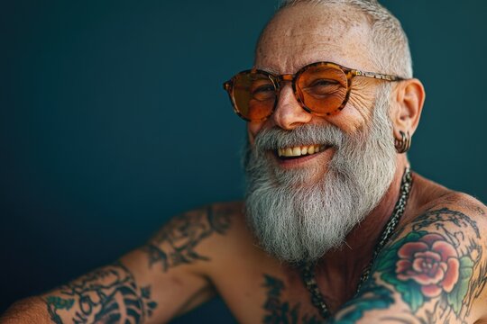 Man with beard and glasses smiling