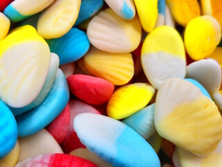 Lots of sweet gummy candies close up. Festive treats