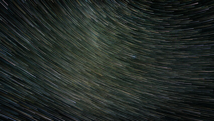 Obraz premium Beautiful Star trails in the night sky. Long exposure star stacking night photography