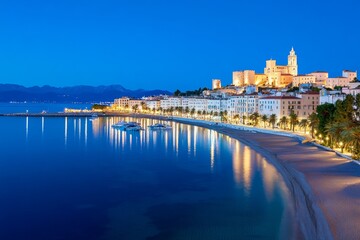 Fototapeta premium Ajaccio reimagined in a futuristic style, with floating buildings and glowing pathways above the Mediterranean Sea