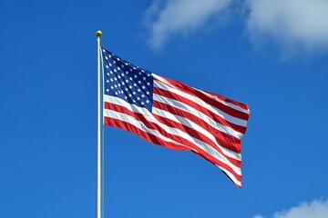 American Flag Waving in Blue Sky