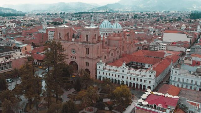 Aerial drone footage captures the Cathedral of Cuenca at golden hour, highlighting its breathtaking architecture and historical significance, the video reveals the cathedral&rsquo;s impressive blue domes gl