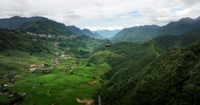 Drone view of yellow gondola on Sun World Fansipan cable car ecotourism activity