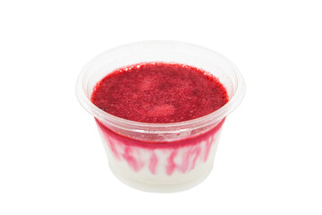 Cherry panacotta. Traditional Italian dessert in a transparent plastic glass isolated on a white background. Food delivery. Fast food to go.