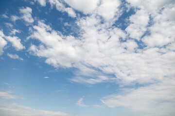 The sky is blue and clear with a few clouds scattered throughout