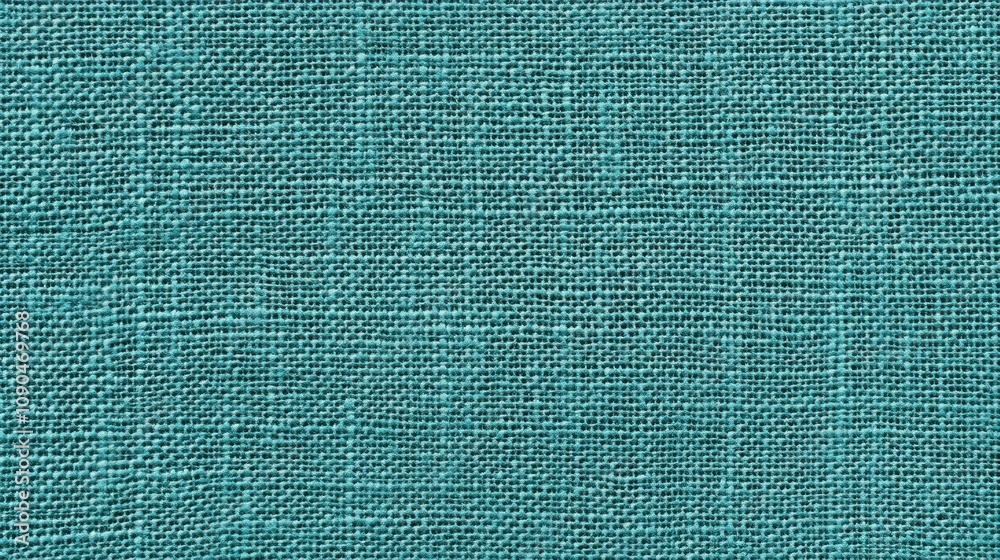 Poster a close-up of textured teal fabric, showcasing its weave and color depth.