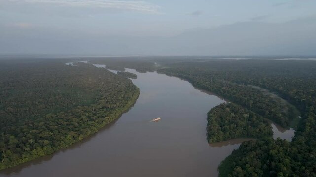 Aerial view of the cruise ship crossing the congo basin rainforest in the democratic republic of Congo.