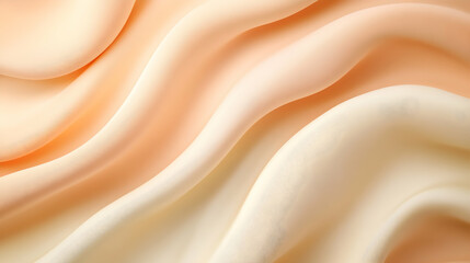 Obraz premium Peach and Cream Fabric Drapes Softly, Creating an Elegant and Luxurious Textured Background Image.