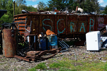 Scrap is thrown in an old wagon which is used as a collection point