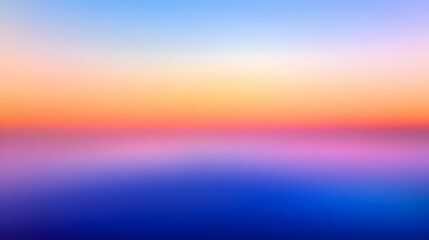 Obraz premium Abstract Blurred Background with Soft Hues of Blue, Pink, and Orange, Representing a Colorful Sunset Over the Horizon