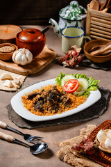 Fried eel with grated galangal or belut goreng lengkuas