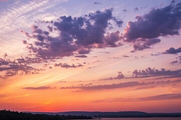Gradual transition from orange to purple shades dominates a subtle abstract watercolor sunset sky background, warm colors, background, soft focus, sky