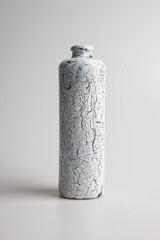 White crackled ceramic bottle vase with textured design