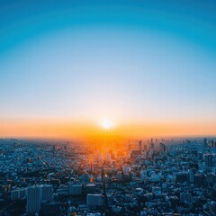 Fototapeta premium A stunning sunrise over a sprawling cityscape, showcasing vibrant colors that blend the sky with urban architecture.