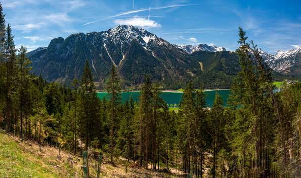 During a spring hiking exercise it is always worth to spot though the green forest nature towards to the Achensee lake and the beautiful turquoise colored water