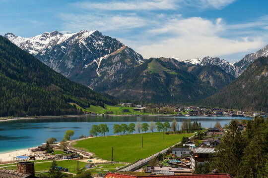 During a spring hiking exercise it is always worth to spot though the green forest nature towards to the Achensee lake and the beautiful turquoise colored water