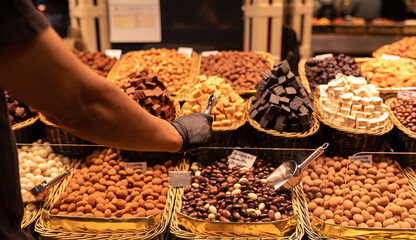 Assortment of chocolates and sweets at a market stall in town