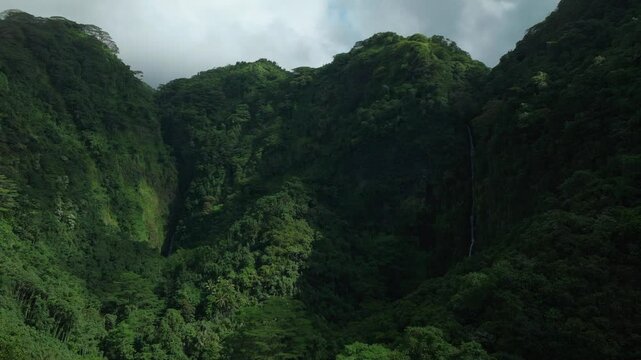 Faarumai Waterfall Falls Tahiti French Polynesia aerial drone Vaimahuta Fall Tiarei Faarumai valley Hitiaa O Te Ra beautiful pool watershed picturesque river cascades made trees forest jungle upward