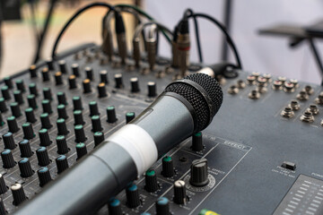 the concert microphone is on the mixing console. The concept of sound recording.